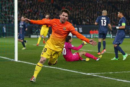 Lionel Messi of Barcelona celebrates scoring the opening goal during the UEFA Champions League quarter-final against Paris Saint-Germain at Parc des Princes on April 2, 2013 in Paris, France.  (GETTY)
