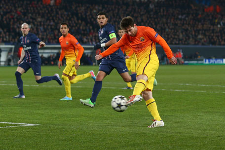 Lionel Messi of Barcelona shoots to score the opening goal during the UEFA Champions League quarter-final against Paris Saint-Germain at Parc des Princes on April 2, 2013 in Paris, France. (GETTY)