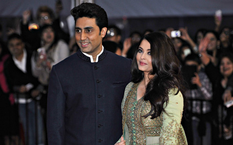 Abhishek Bachchan arrives with his wife actress Aishwarya Rai for the inaugural Times of India Film Awards in Vancouver, British Columbia. (REUTERS)