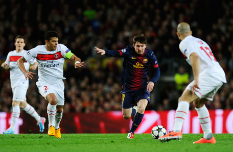 Thiago Silva of PSG chases down Lionel Messi of Barcelona during the UEFA Champions League quarter-final second leg at Nou Camp on April 10, 2013 in Barcelona, Spain. (GETTY)