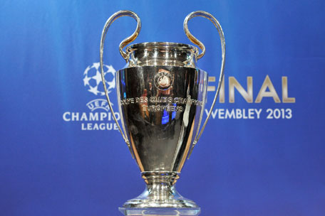 The UEFA Champions League trophy is displayed during the UEFA Champions League semi-final and final draws at the UEFA headquarters on April 12, 2013 in Nyon, Switzerland. (GETTY)