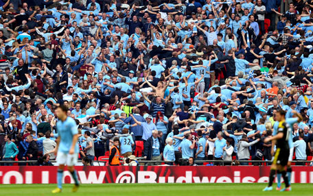 Manchester City fans perform the 'Pozan' as Sergio Aguero of Manchester City scores their second goal during the FA Cup semifinal against Chelsea at Wembley Stadium on April 14, 2013 in London, England. (GETTY)