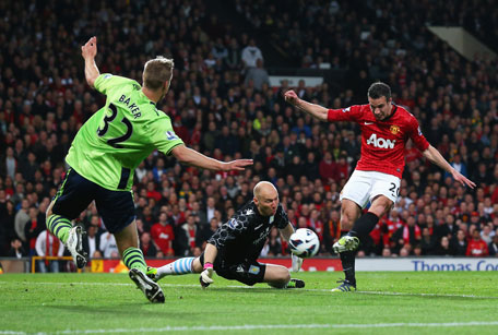 Robin van Persie of Manchester United scores his second goal during the Barclays Premier League match against Aston Villa at Old Trafford on April 22, 2013 in Manchester, England. (GETTY)