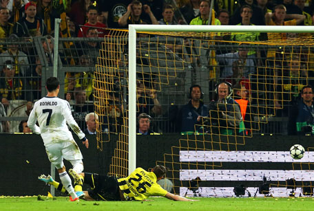 Cristiano Ronaldo of Real Madrid scores their first goal during the UEFA Champions League semifinal first leg match against Borussia Dortmund at Signal Iduna Park on April 24, 2013 in Dortmund, Germany. (GETTY)