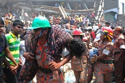 People injured in Bangladesh garment factory building collapse are rescued. (AFP)