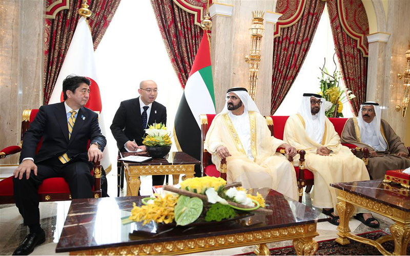 Mohammed bin Rashid and Shinzo Abe in presence of Mohammed bin Zayed (WAM)
