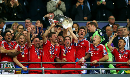 Captain Philipp Lahm of Bayern Munich lifts the trophy after winning the UEFA Champions League final against Borussia Dortmund at Wembley Stadium on May 25, 2013 in London, United Kingdom. (GETTY)