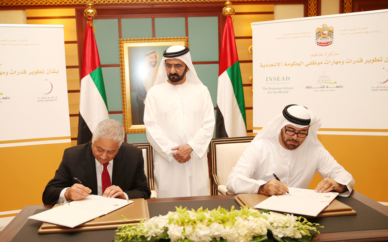 Sheikh Mohammed at the signing of agreements with three universities to train federal government staff, in Abu Dhabi on Monday. (Wam)