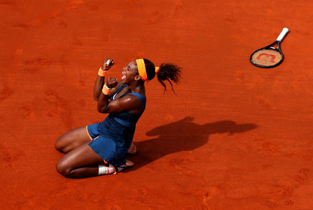 Serena Williams of the US celebrates match point in her Women's Singles Final against Maria Sharapova of Russia during day fourteen of French Open at Roland Garros on June 8, 2013 in Paris, France. (GETTY)
