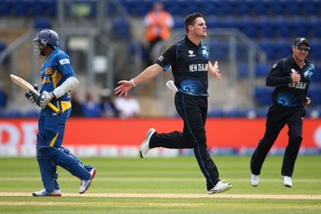 Mitchell McClenaghan (centre) of New Zealand celebrates bowling Dilshan Tilakarathne of Sri Lanka during the Group A ICC Champions Trophy match at the SWALEC Stadium on June 9, 2013 in Cardiff, Wales. (GETTY)