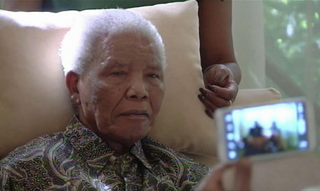 In this file photo taken from video, the ailing anti-apartheid icon Nelson Madela is filmed Monday April 29, 2013, more than three weeks after being released from hospital.  Mandela was taken to a hospital Saturday, June 8, 2013 to be treated for a recurrence of a lung infection and is in "serious but stable" condition, the president's office said. (AP)