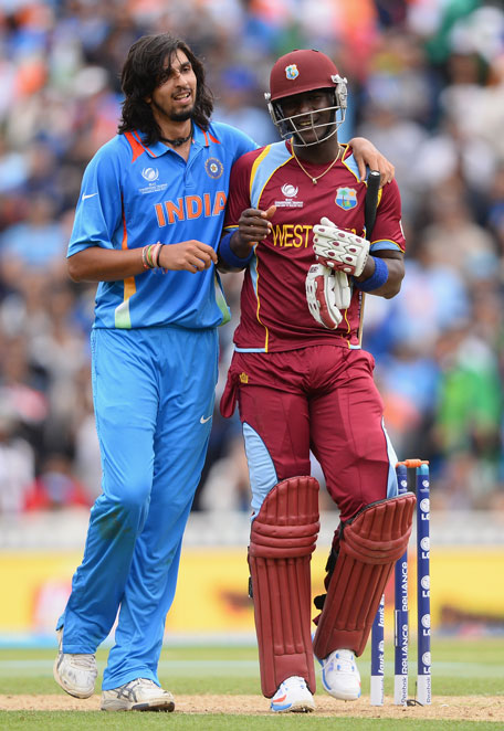 Ishant Sharma of India and Darren Sammy of West Indies share a joke during the ICC Champions Trophy Group B match at The Oval on June 11, 2013 in London, England. (GETTY)