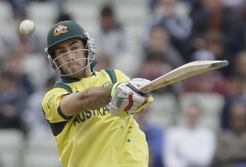 Australia's Glenn Maxwell hits two runs off the bowling of New Zealand's Mitchell McClenaghan during their group stage ICC Trophy cricket match at Edgbaston, Birmingham, England. (AP)