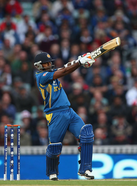 Nuwan Kulasekara of Sri Lanka hits out during the ICC Champions Trophy Group A match against England at The Oval on June 13, 2013 in London, England. (GETTY)