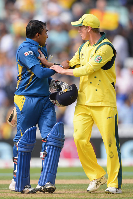Mahela Jayawardena of Sri Lanka is restrained by the Australian captain George Bailey at the end of the Sri Lankan innings during the ICC Champions Trophy Group A fixture at The Oval on June 17, 2013 in London, England. (GETTY)