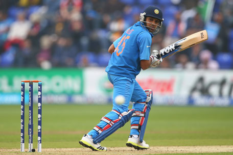 Rohit Sharma of India steers a shot to third man during the ICC Champions Trophy Semi-Final against Sri Lanka at the SWALEC Stadium on June 20, 2013 in Cardiff, Wales. (GETTY)