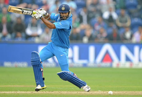 India's Shikhar Dhawan bats during the 2013 ICC Champions Trophy semi-final against Sri Lanka at the Cardiff Wales Stadium in Wales on 20 June 2013. (AFP)