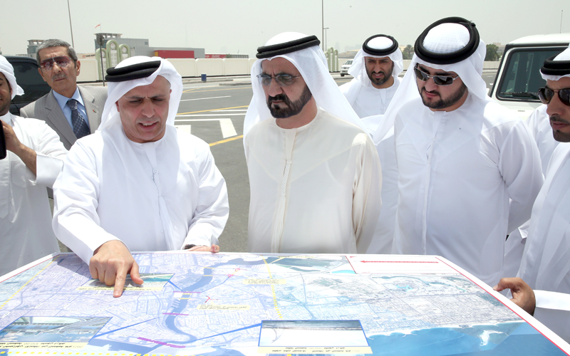 His Highness Sheikh Mohammed bin Rashid Al Maktoum views the Al Ittihad Bridge project (Wam)