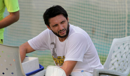 Pakistani cricketer Shahid Afridi takes a break while he attends a practice session in Lahore, Pakistan, on Wednesday, July 3, 2013. (AP)