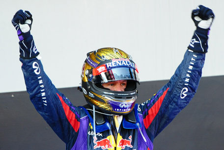 Red Bull Racing's Sebastian Vettel celebrates after winning the German Formula One Grand Prix race on July 7, 2013 at the Nuerburgring circuit in Nuerburg, Germany. (AFP)