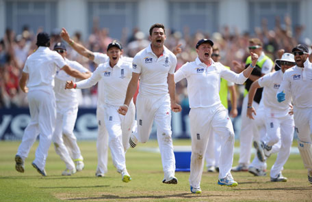 James Anderson of England celebrates the final wicket of Brad Haddin of Australia and victory with team mates during day five of the 1st Ashes Test at Trent Bridge on July 14, 2013 in Nottingham, England. (GETTY)