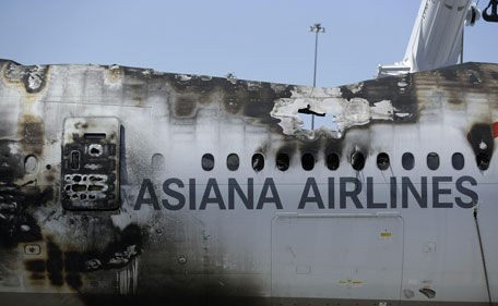 The wreckage of Asiana Flight 214, which crashed on Saturday, July 6, 2013, seen at San Francisco International Airport, in San Francisco, Friday, July 12, 2013. Two people were killed and dozens of others injured although most suffered minor injuries. Investigators have said the plane came in too low and slow. (AP)