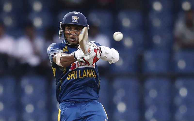 Sri Lanka's captain Dinesh Chandimal plays a shot during the second One Day International match against South Africa in Colombo July 23, 2013. (REUTERS)