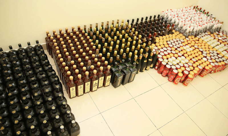Bottles of alcoholic beverages found in the house of the man arrested in Ras Al Khaimah.
