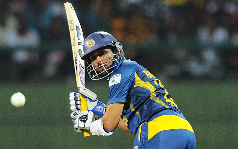 Sri Lankan cricketer Tillakaratne Dilshan plays a shot during the fourth One Day International (ODI) cricket match between Sri Lanka and South Africa at the Pallekele International Cricket Stadium in Pallekele on July 28, 2013. (AFP)