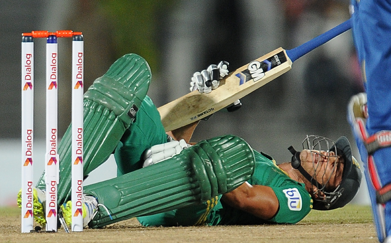 South African cricket captain Faf du Plessis reacts to a ball hitting his groin area during the third and final Twenty20 cricket match between Sri Lanka and South Africa at the Suriyawewa Mahinda Rajapakse International Cricket Stadium in the southern district of Hambantota on August 6,2013. (AFP)