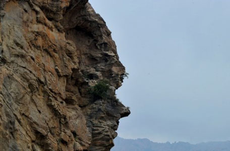 mountain face human shaped saudi