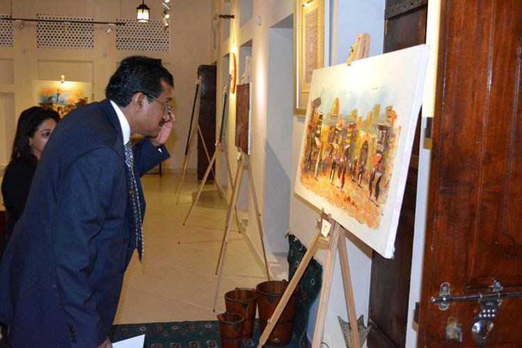 Indian ambassador MK Lokesh checking out an art work