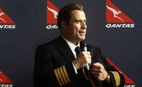 John Travolta speaking to Qantas employees during Qantas’ 90th anniversary celebrations at Sydney Airport, November 6, 2010, in his role as Qantas ambassador. (REUTERS)