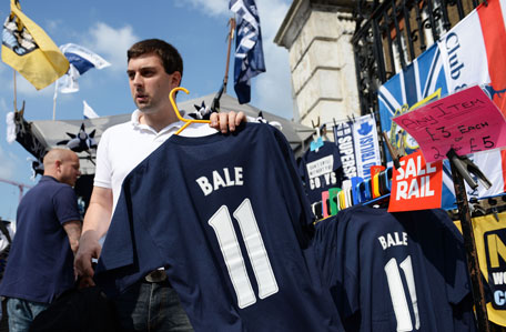 Cut price Gareth Bale merchandise is offered by vendors prior to kick off during the Barclays Premier League match between Tottenham Hotspur and Swansea City at White Hart Lane on August 25, 2013 in London, England. (GETTY)