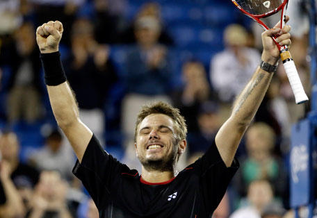 Stanislas Wawrinka of Switzerland celebrates after defeating Tomas Berdych of the Czech Republic, in the fourth round of the US Open tennis tournament, Tuesday, Sept. 3, 2013, in New York. (AP)