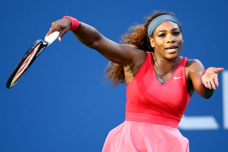 Serena Williams throws her racket after losing the second set tiebreak to  Victoria Azarenka of Belarus in the Woman's Final in Arthur Ashe Stadium at  the U.S. Open Tennis Championships at the