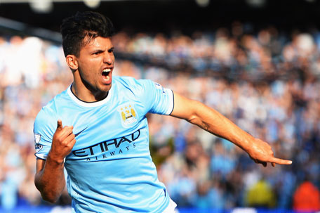 Manchester City's Sergio Aguero celebrates as he scores their first goal during the Barclays Premier League match against Manchester United at the Etihad Stadium on September 22, 2013 in Manchester, England. (GETTY)