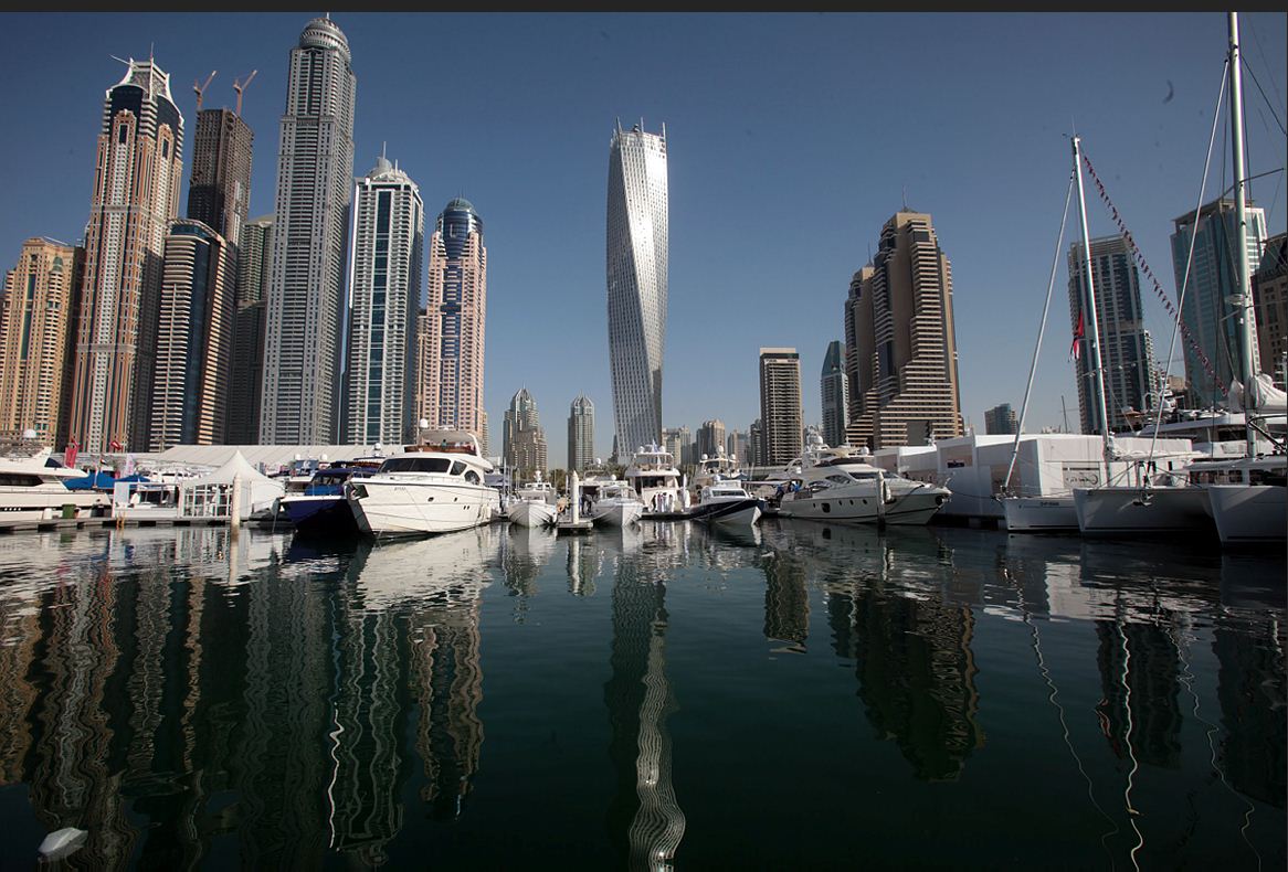 Visitors views yachts and other luxury items on display at the Dubai International boat show at the Marina in Dubai. (Patrick Castillo)
