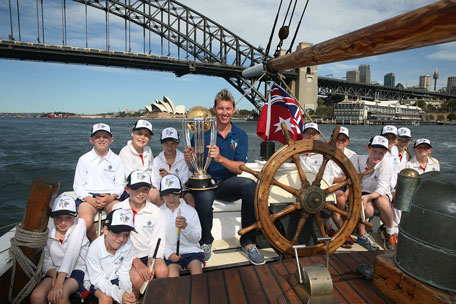 Australia’s World Cup winner Brett Lee poses on the Sydney Harbour with the ICC Cricket World Cup trophy and junior cricketers from Mosman cricket club during celebrations to mark 500 days to go until the ICC Cricket World Cup 2015. (SUPPLIED)
