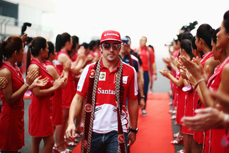 Fernando Alonso of Spain and Ferrari attends the drivers parade before the Indian Formula One Grand Prix at Buddh International Circuit on October 27, 2013 in Noida, India. (GETTY)