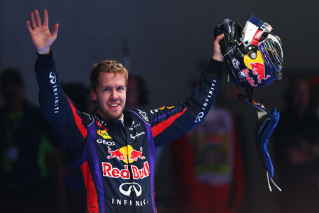 Race winner and 2013 Formula One World Champion Sebastian Vettel of Germany and Infiniti Red Bull Racing celebrates in parc ferme following the Indian Formula One Grand Prix at Buddh International Circuit on October 27, 2013 in Noida, India. (GETTY)