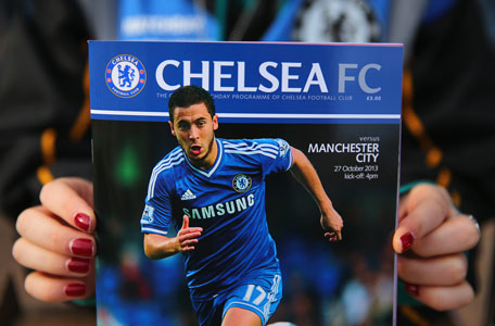 A fan holds up the match day programme during the Barclays Premier League match between Chelsea and Manchester City at Stamford Bridge on October 27, 2013 in London, England. (GETTY)