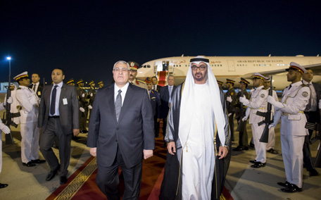 General Sheikh Mohamed bin Zayed Al Nahyan, Crown Prince of Abu Dhabi and Deputy Supreme Commander of UAE Armed Forces, receives Adly Mansour Interim President of Egypt, at the Presidential Airport. The Egyptian Interim President is on an official visit to the UAE. (Ryan Carter/Crown Prince Court - Abu Dhabi)