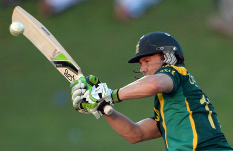 South African captain AB de Villiers plays a shot during the third day-night international in Sheikh Zayed Cricket Stadium in Abu Dhabi on November 6, 2013. (AFP)