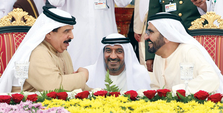 His Highness Sheikh Mohammed and King Hamad of Bahrain at the Dubai Air Show, with Sheikh Ahmed bin Saeed Al Maktoum. (Al Bayan)