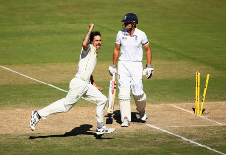 Mitchell Johnson of Australia celebrates after he took the wicket of Alastair Cook of England during day two of the Second Ashes Test at Adelaide Oval on December 6, 2013 in Adelaide, Australia. (GETTY)