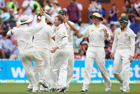 Steve Smith of Australia celebrates after taking the wicket of Ian Bell of England during day four of the Second Ashes Test at Adelaide Oval on December 8, 2013 in Adelaide, Australia. (GETTY)