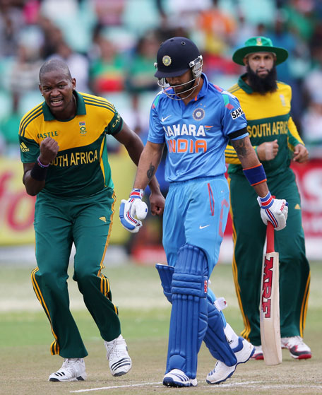 Lonwabo Tsotsobe celebrates Virat Kohli's wicket during the 2nd Momentum ODI match between South Africa and India at Sahara Stadium Kingsmead on December 08, 2013 in Durban, South Africa. (GETTY)