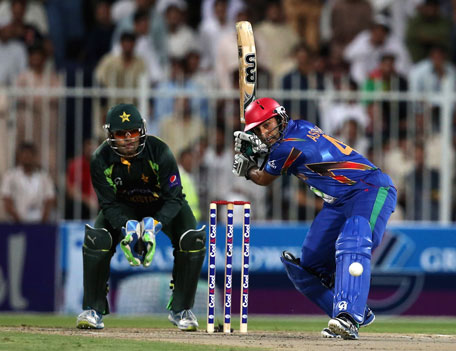 Nawroz Mangal of Afghanistan bats during the Twenty20 match between Afghanistan and Pakistan at the Sharjah Cricket Stadium on December 8, 2013 in Sharjah, UAE. (GETTY)