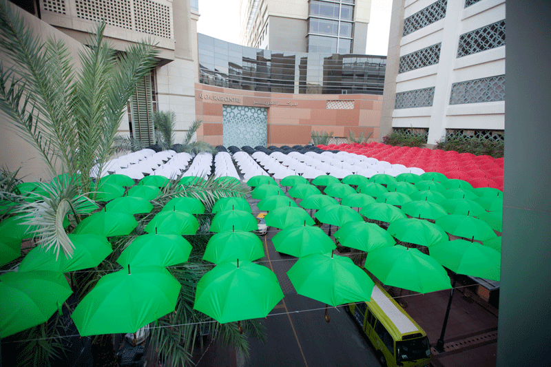 Umbrellas in UAE flag's colours at Dubai's Al Ghurair Centre.